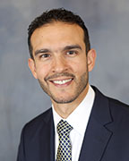 A portrait of a staff member